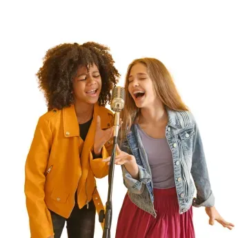 Two singers performing into a vintage microphone, leaning in and singing with energy on a white background
