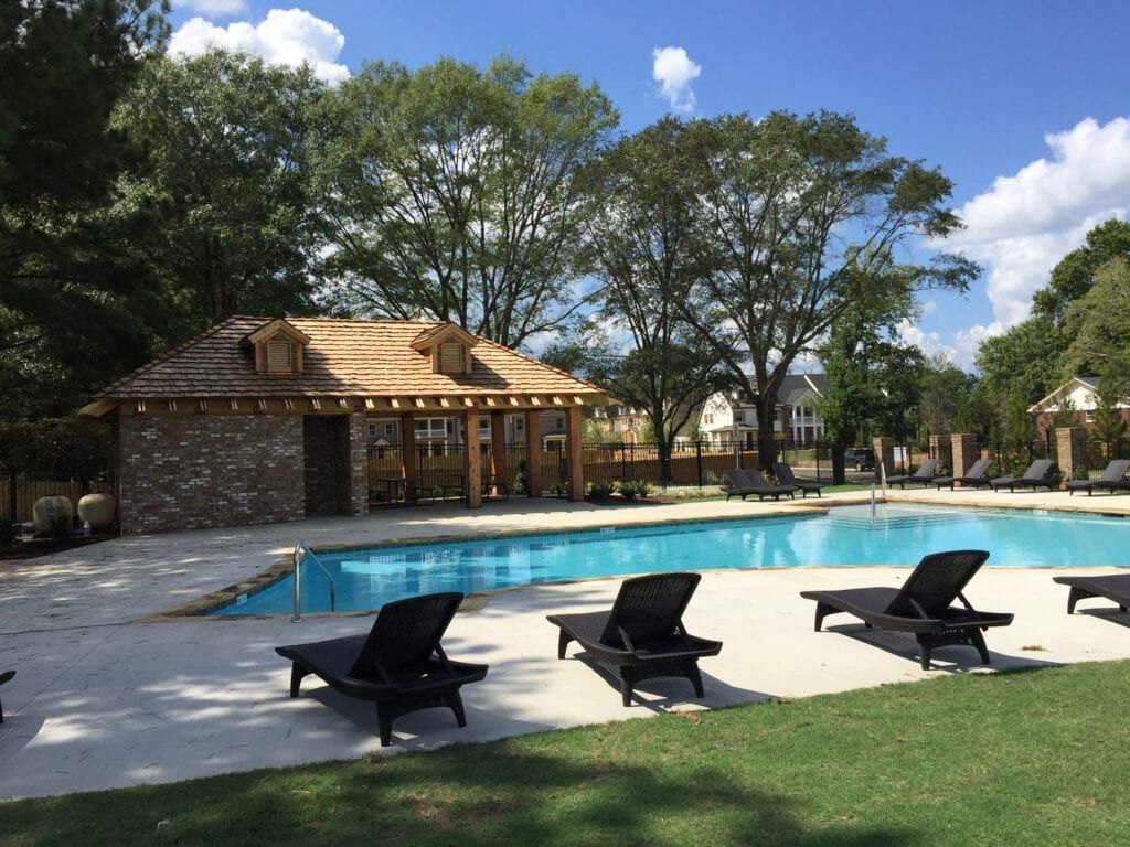 Pool and community entrance at a Palmer Construction Company property.