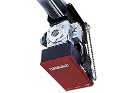 Red and black garage door opener motor mounted on a metal ceiling rail Red and black garage door opener motor mounted on a metal ceiling rail