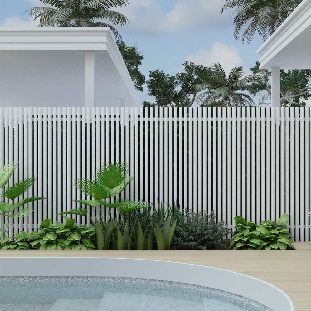 A White Fence Surrounds a Swimming Pool With Palm Trees in the Background — DC Fencing In Wondunna, QLD