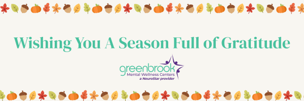 Greeting card with autumn-themed border, teal text reads 