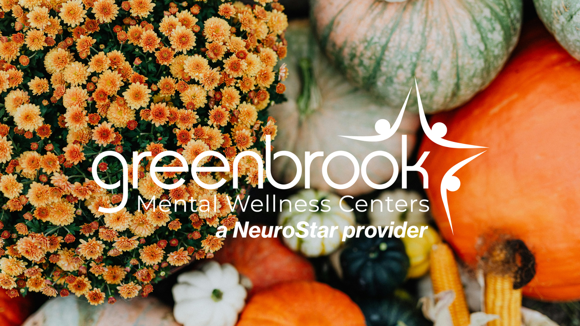 Greenbrook Mental Wellness Centers logo over a colorful arrangement of pumpkins, gourds, and flowers.