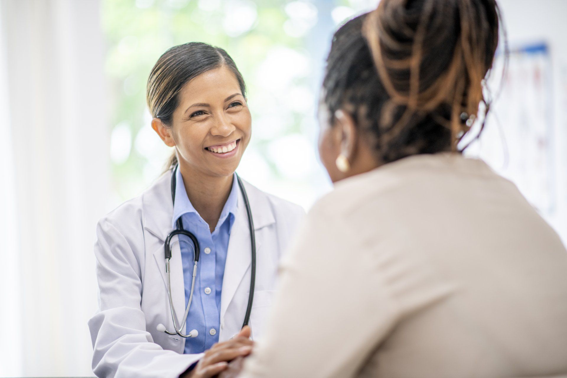 Female Patient speaking with a  doctor