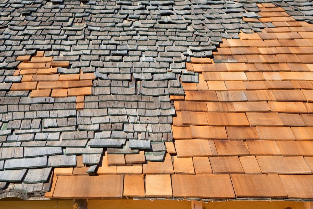 Close-up of a Wood Shingle Roof Needed to Repaired — Boostn Pty Ltd in Tin Can Bay, QLD