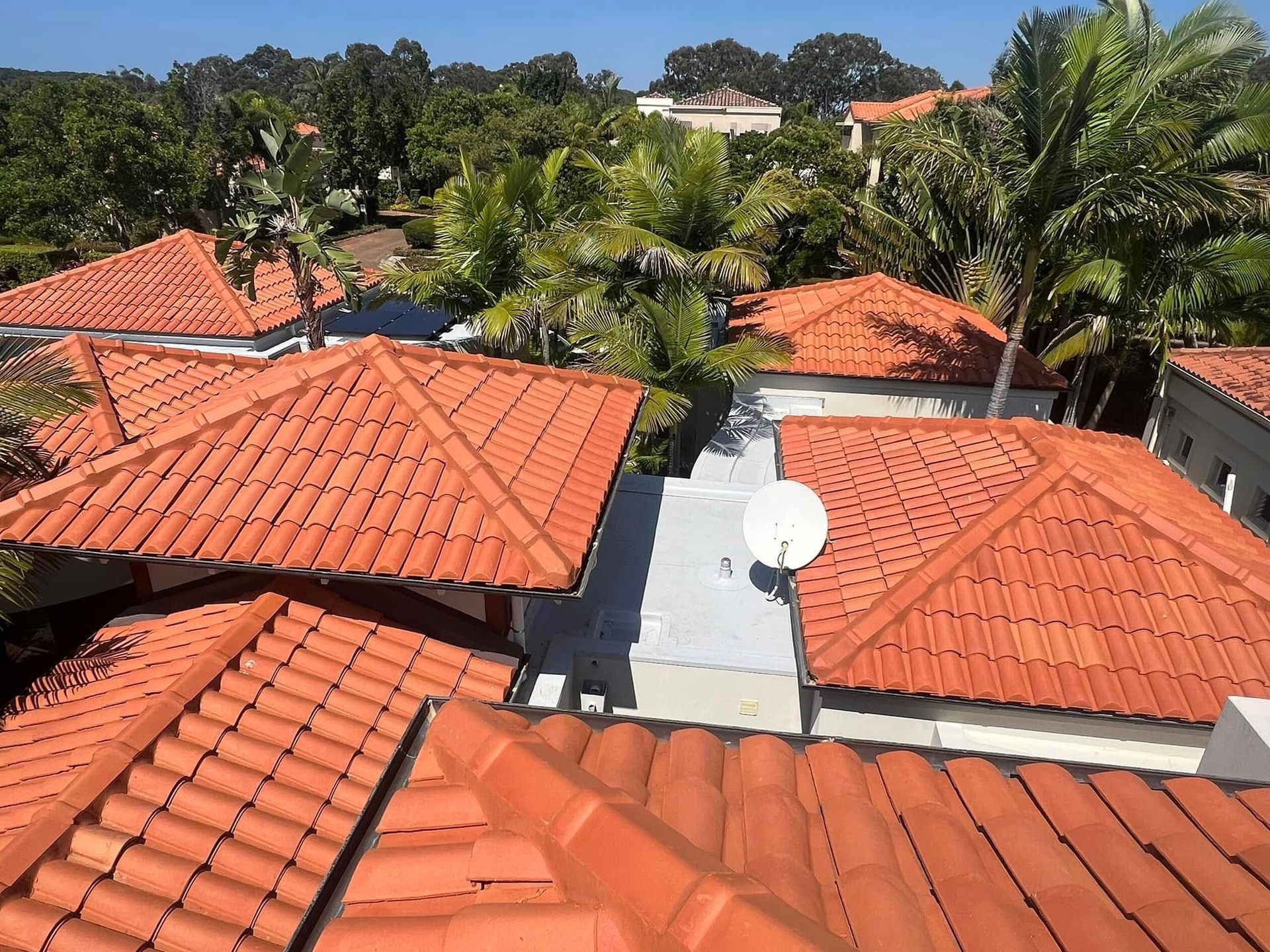Red-tiled Rooftops With a Satellite Dish — Boostn Pty Ltd in Glastonbury, QLD
