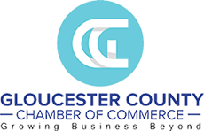 The Gloucester County Chamber of Commerce logo, featuring a blue circular icon with white text on a white background.