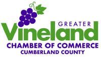 Logo for Greater Vineland Chamber of Commerce, Cumberland County, featuring a purple grape cluster and green text.