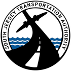 Home Page Circular logo of the South Jersey Transportation Authority featuring a black road, an airplane silhouette, and blue waves.