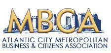 Logo for the Atlantic City Metropolitan Business & Citizens Association (MBCA) featuring gold lettering over city skyline.