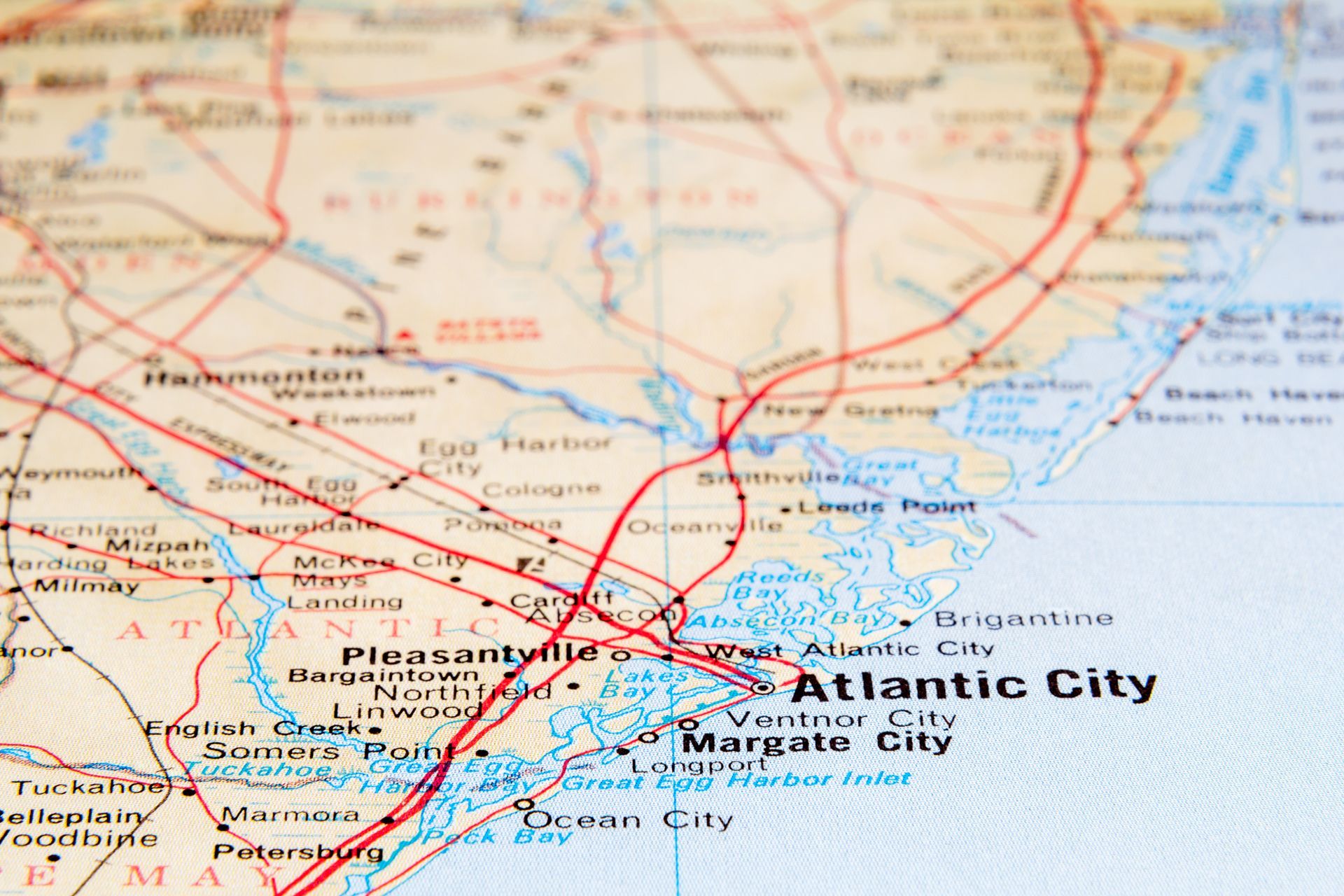 A close-up view of a printed road map showing Atlantic City, New Jersey, and surrounding towns.