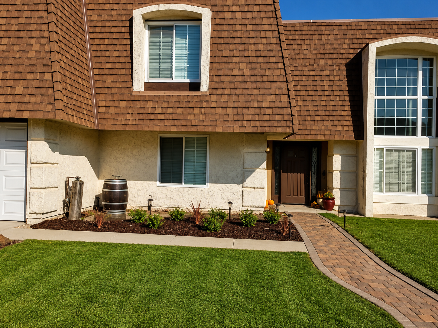 Suburban house exterior with brick facade, front walkway, green lawn, and potted plants by the entrance