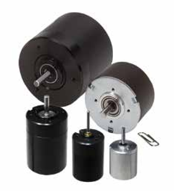 Two motors are sitting on top of each other in a warehouse.