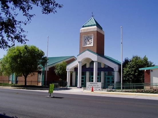 a large building with a clock on top of it