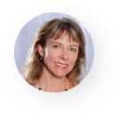 A woman is smiling in a circle on a white background.