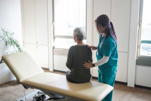 Chiropractic exam for senior with back pain, osteopathy & physical therapy care. Chiropractic exam for senior with back pain, osteopathy & physical therapy care.