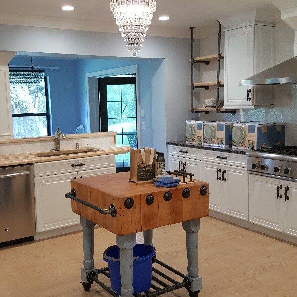 Freshly painted kitchen by Local Painting Contractors in Venice, FL showcasing modern white cabinets