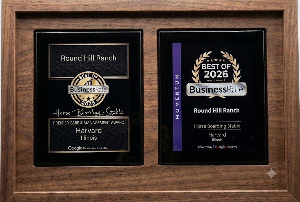 Two award plaques for Round Hill Ranch, one from Harvard and one “Best of 2026” on a black background