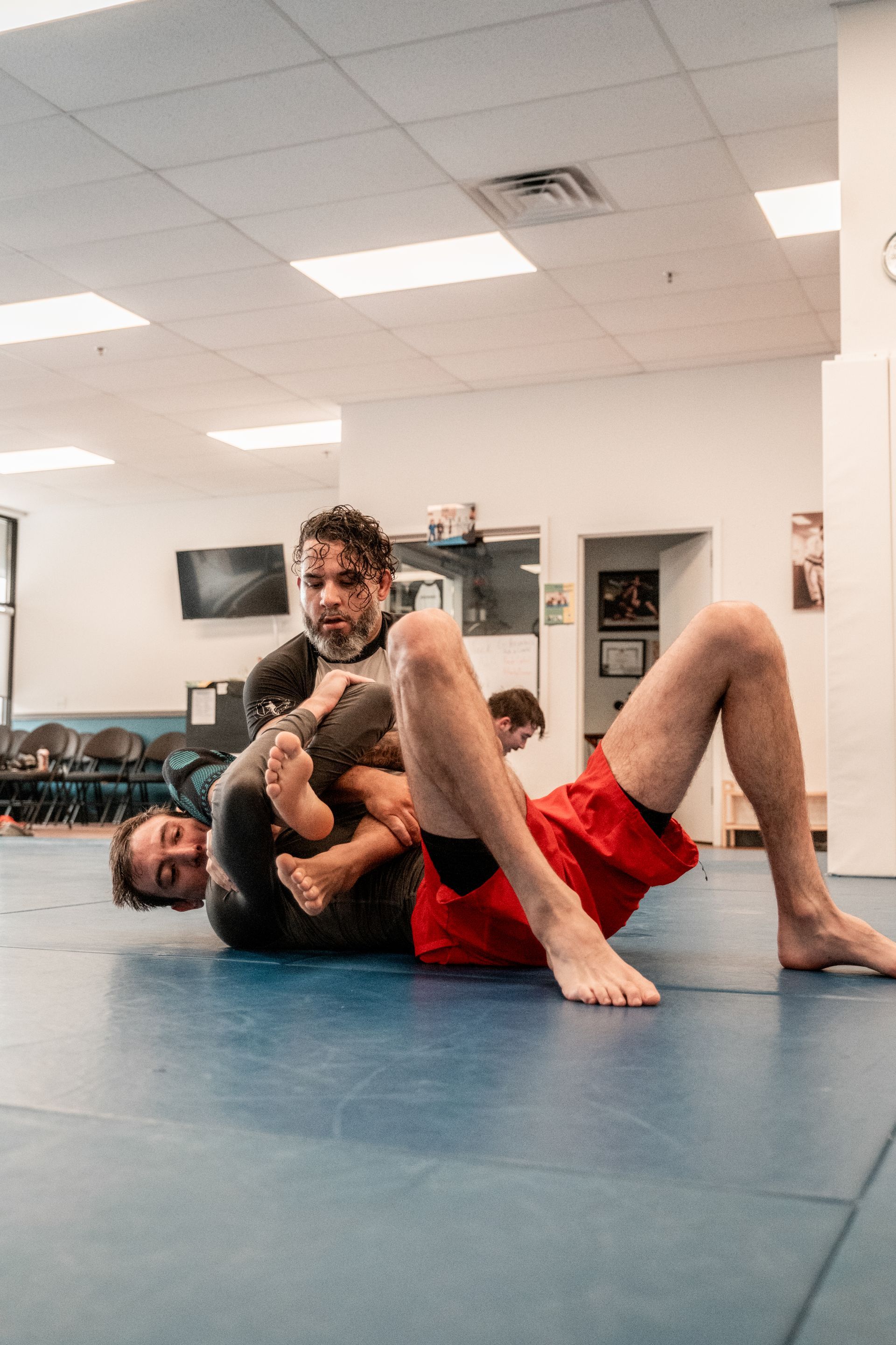 Adults practicing Brazilian Jiu-Jitsu drills at Montgomery Brazilian Jiu-Jitsu in Montgomery, NJ to build confidence.