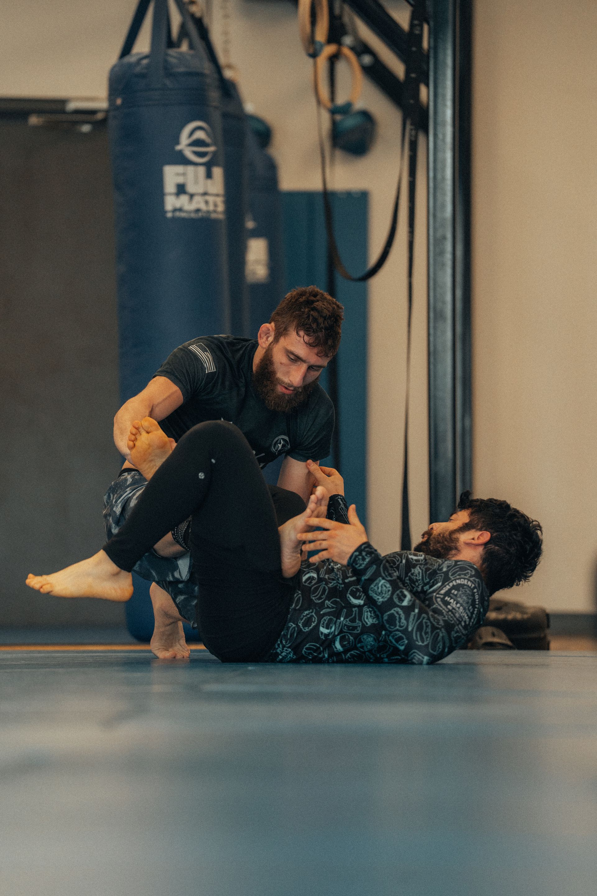 Adults drilling Brazilian Jiu-Jitsu techniques at Montgomery Brazilian Jiu-Jitsu in Montgomery, NJ for strength and stress relief.