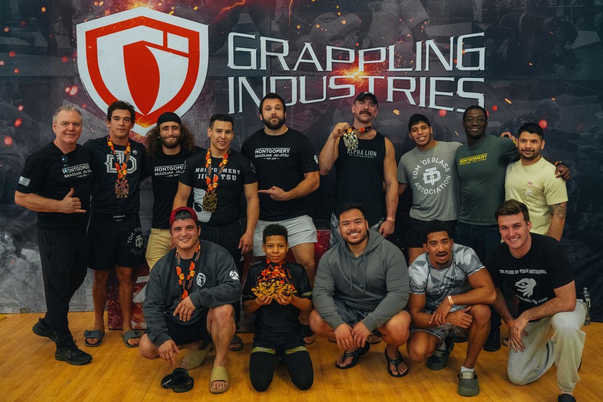 Adults practicing Jiu-jitsu sparring at Montgomery Brazilian Jiu-Jitsu in Montgomery, NJ for fitness and stress relief