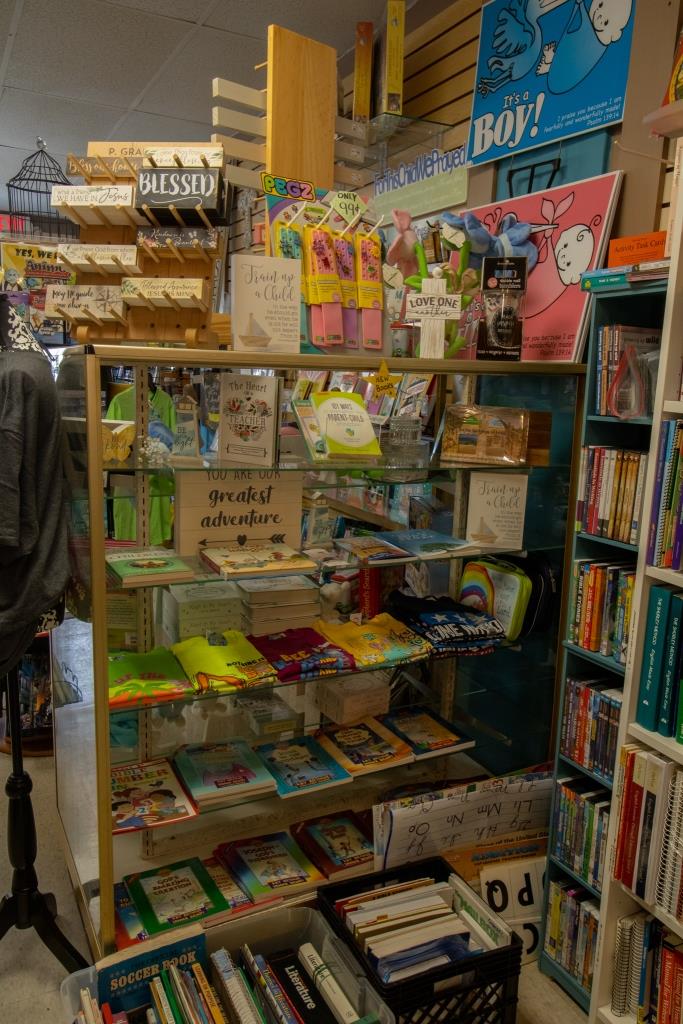 A book store with a sign that says Boy! on it.
