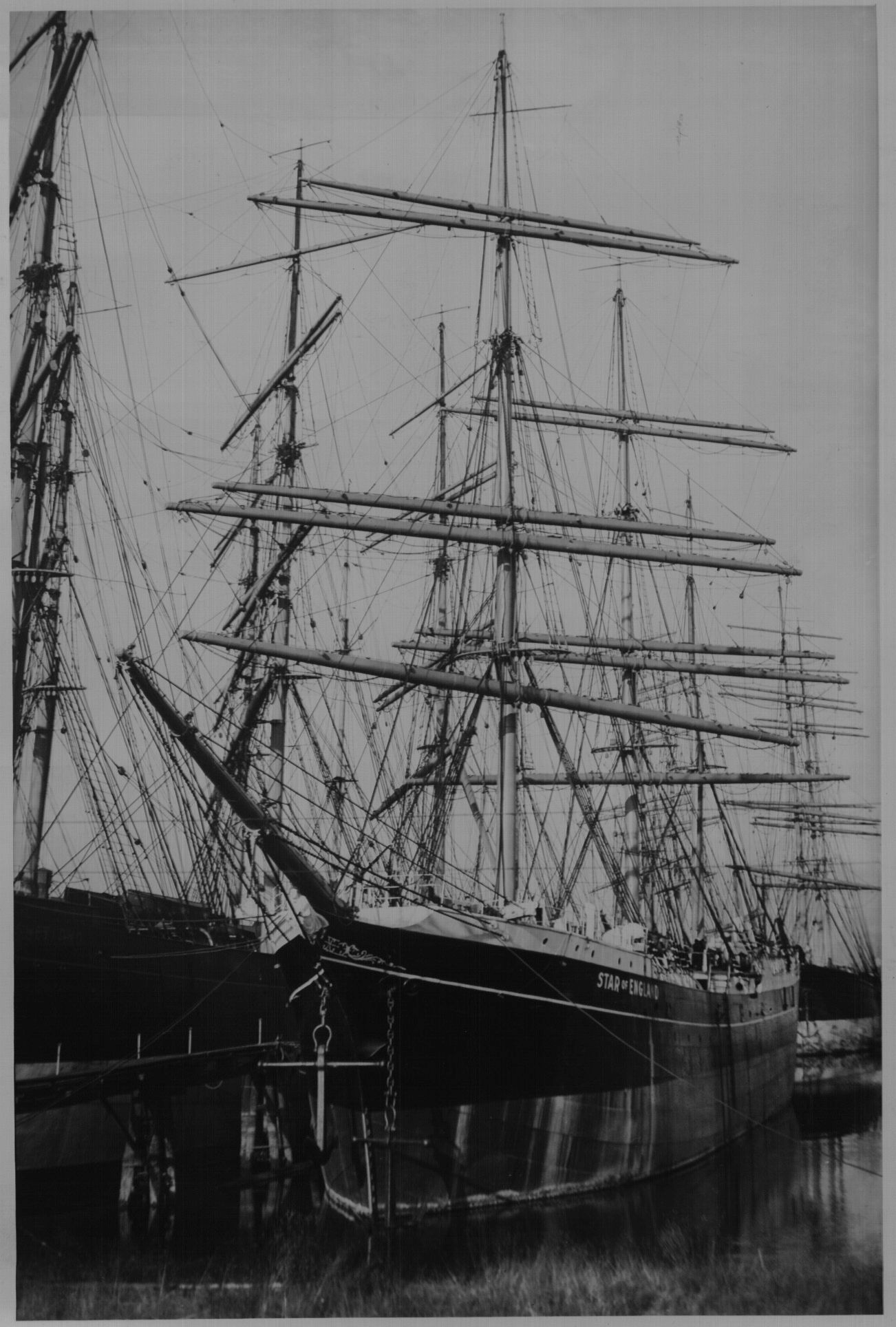 A black and white photo of a large ship in the water