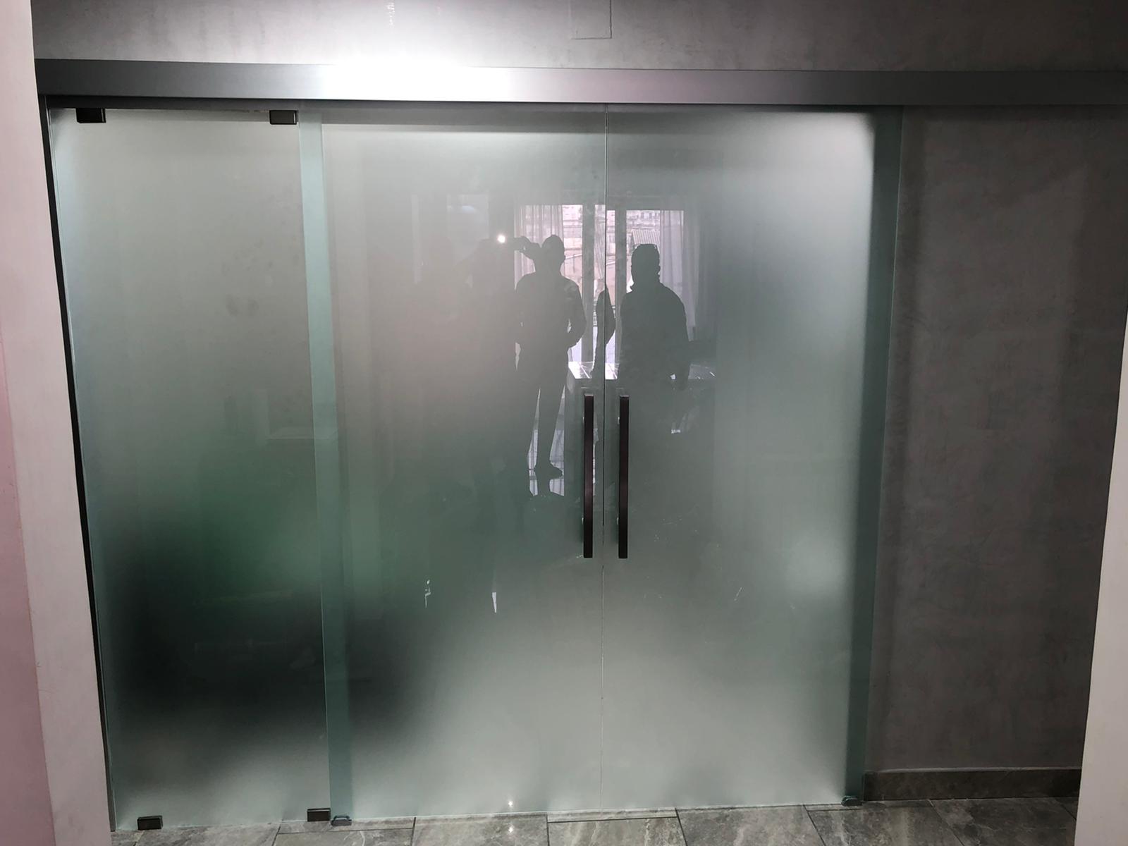 porta doppia anta in  vetro