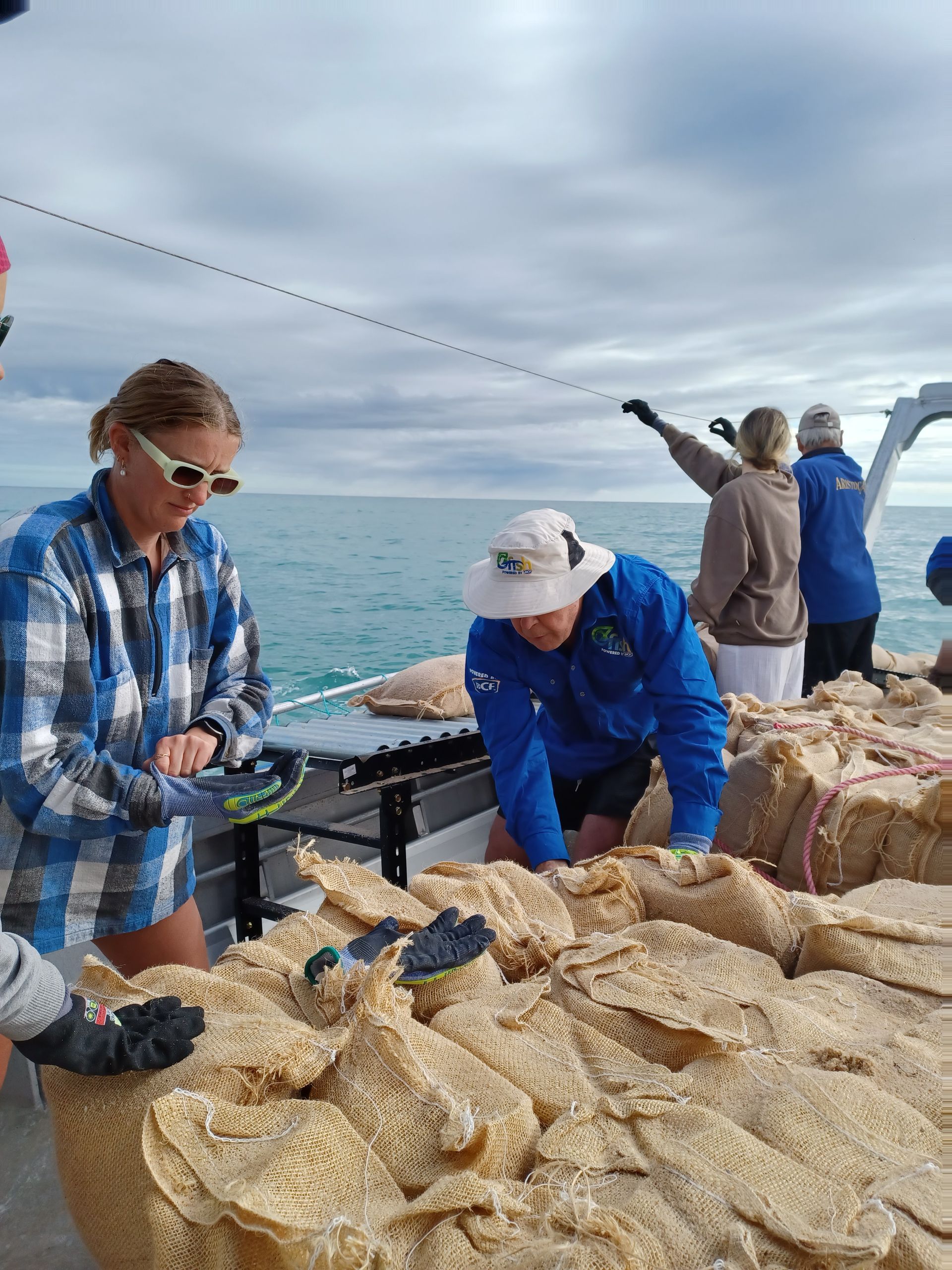 our team completing final checks of hessian bags