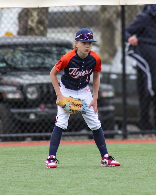 youth baseball player playing at the field