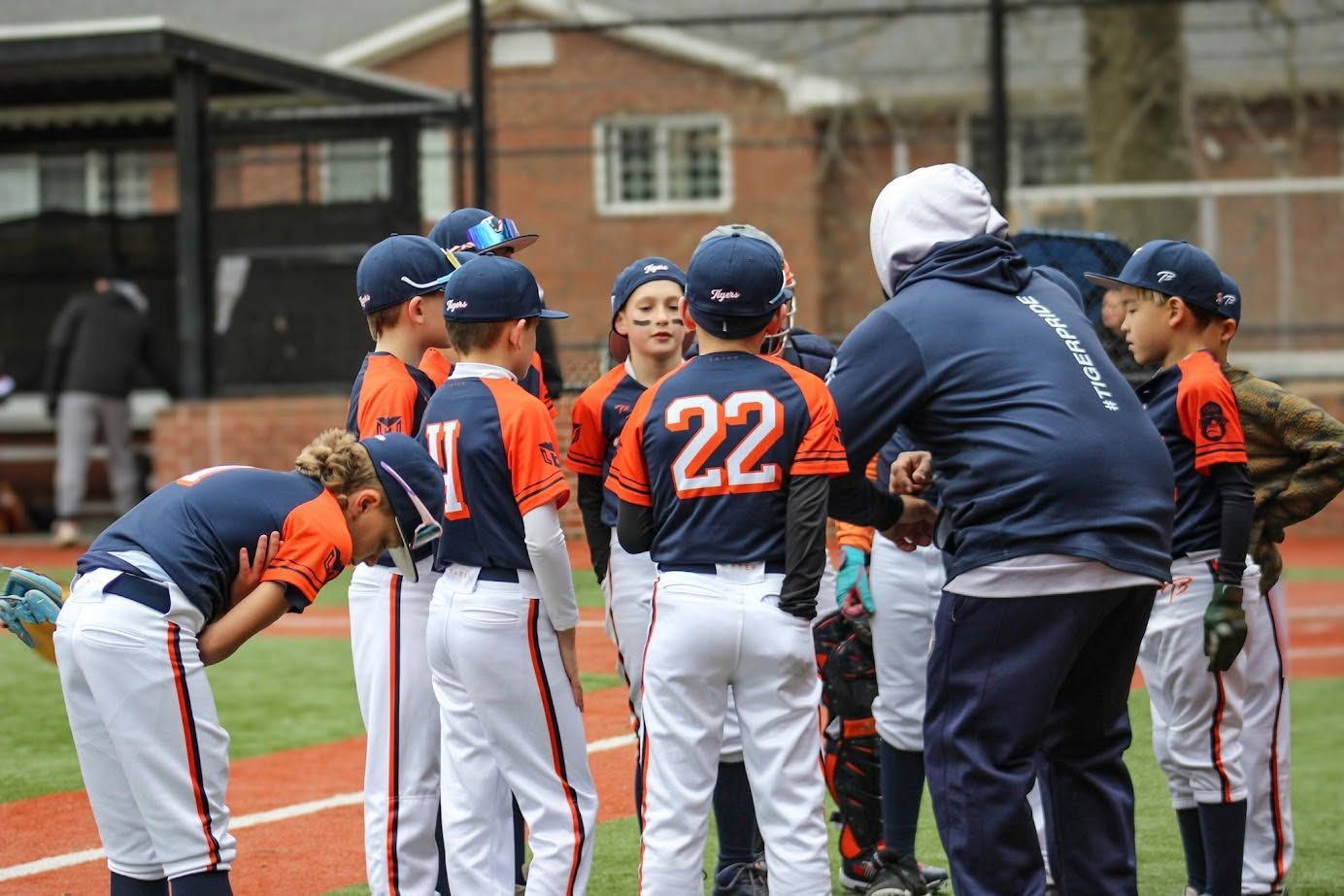 youth baseball player playing at the field