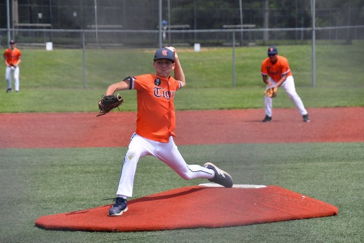 youth baseball player playing at the field