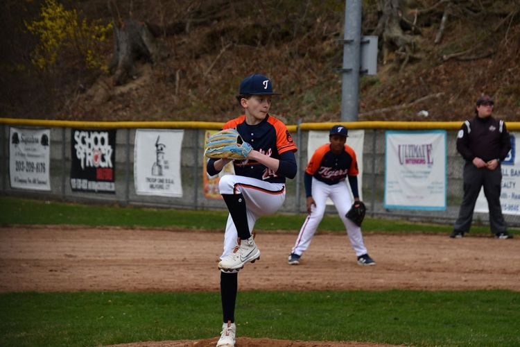 youth baseball player playing at the field