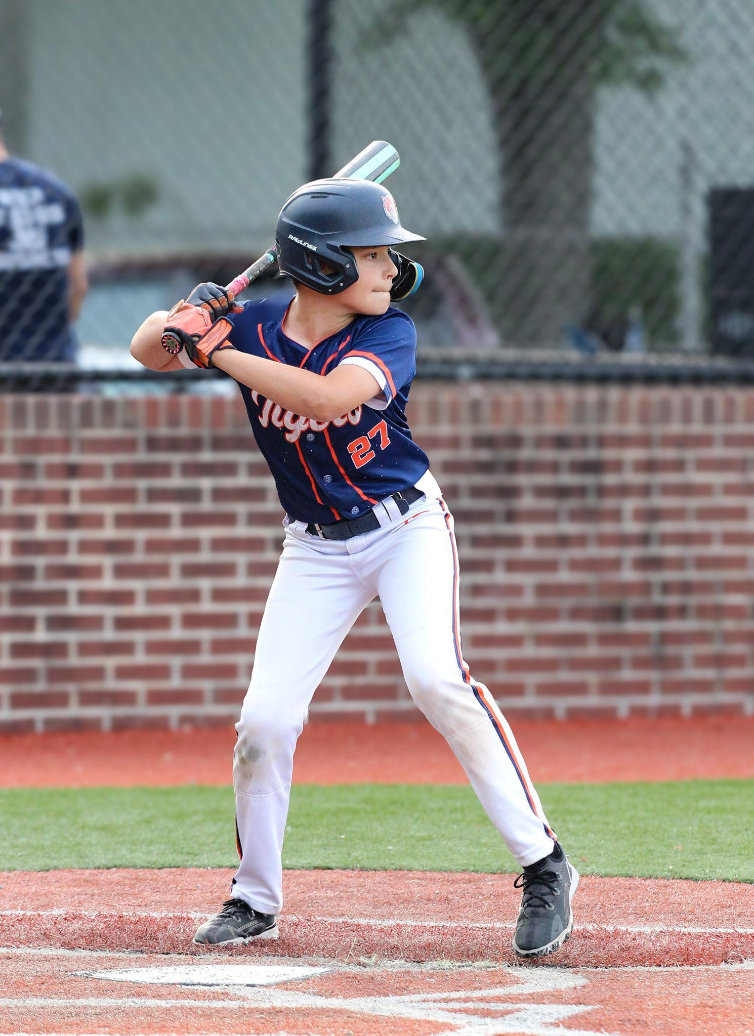 youth baseball player playing at the field