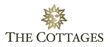 The logo for the cottages has a sun with a face on it.