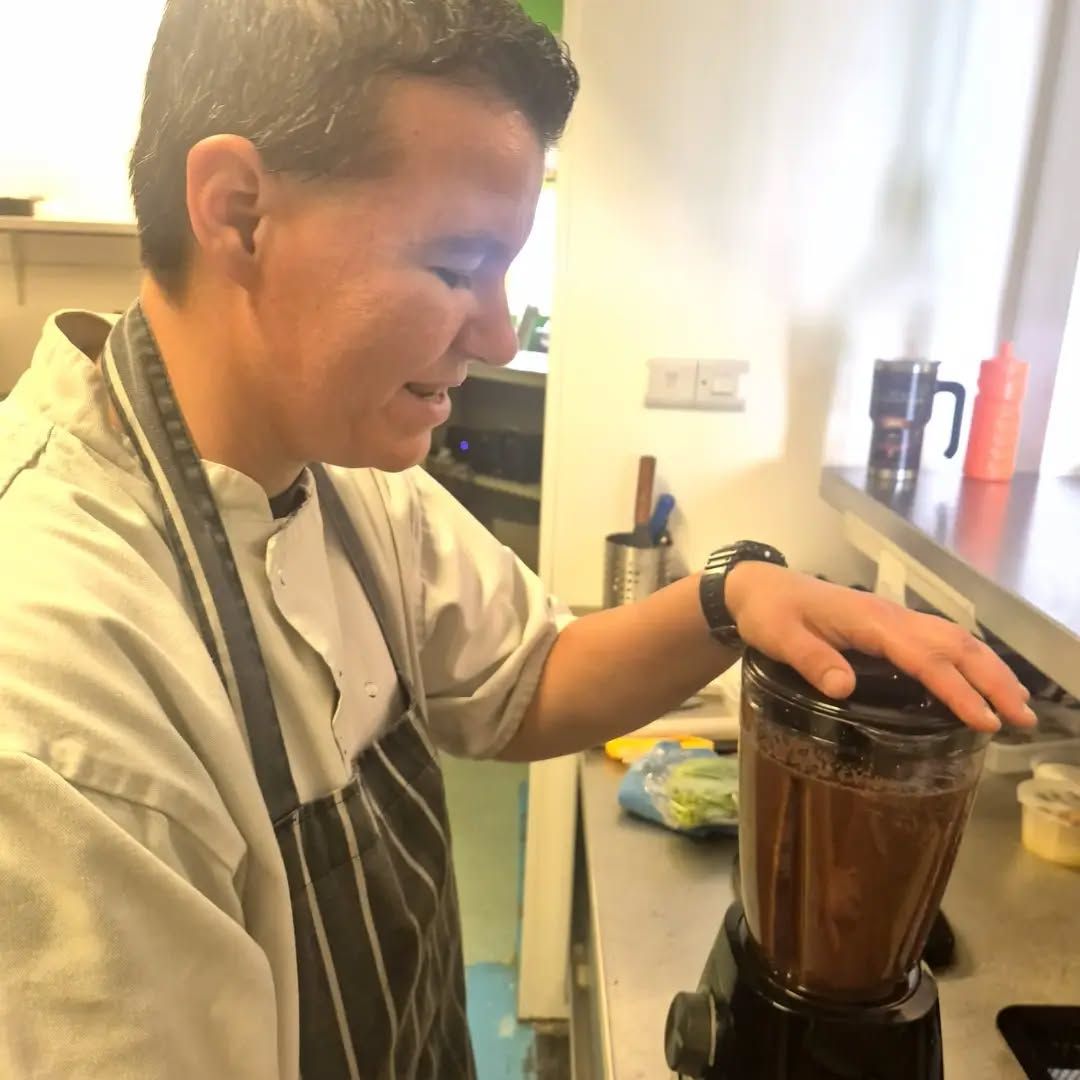 Kris working in the kitchen
