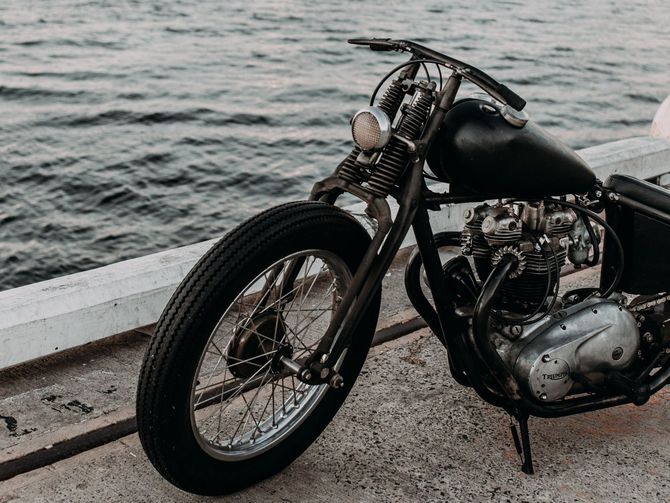 Vintage motorcycle by the ocean