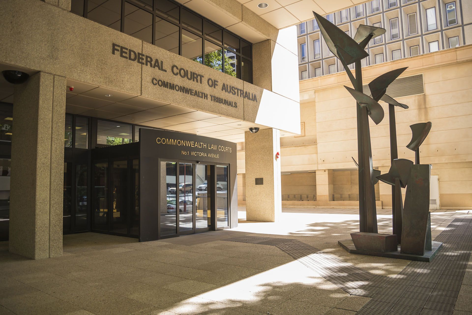 federal court of australia building with a sculpture in front of it