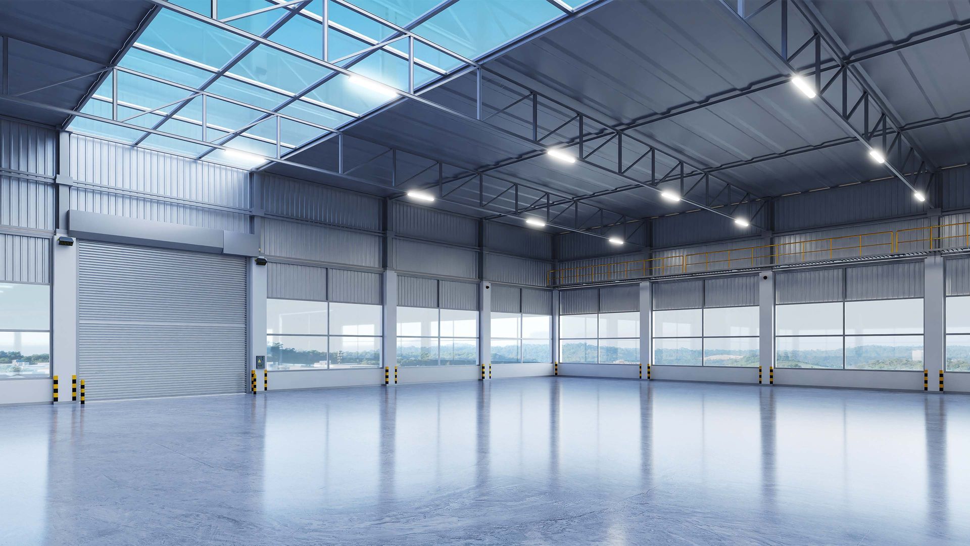Empty industrial warehouse with a shiny concrete floor and open bay doors.