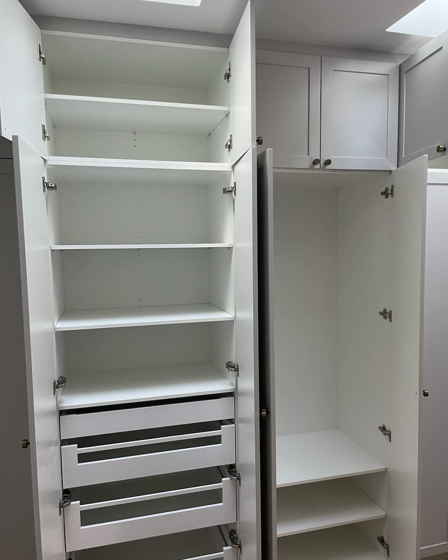 White Closet With Open Doors, Revealing Shelves and Drawers — Maken Kitchens & Cabinets in Chinderah, NSW
