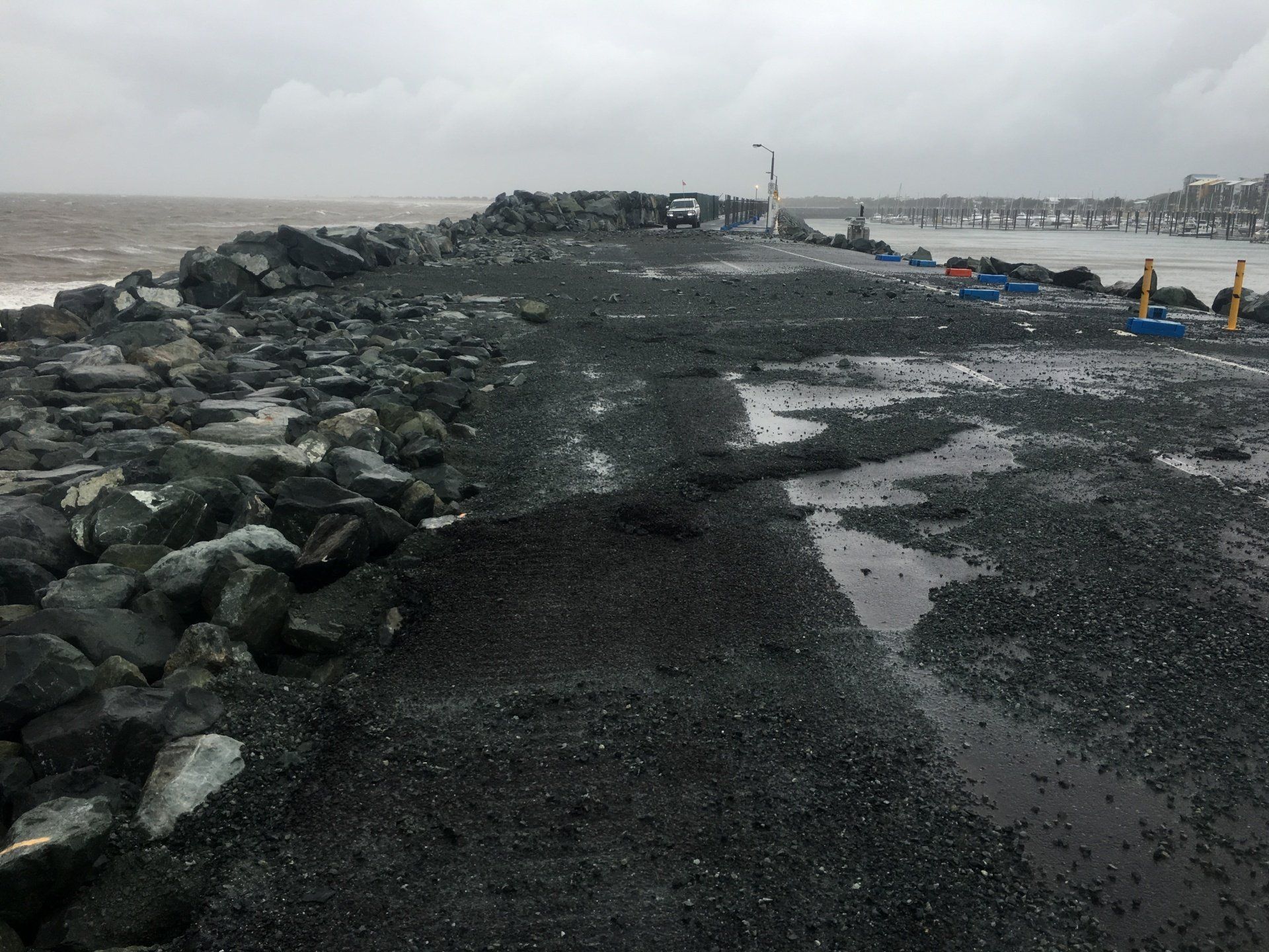 Rocky Coastline Under a Cloudy Sky, With Dark Rocks and Gravel — CJD Investments (NQ) Pty Ltd in Mackay Harbour, QLD