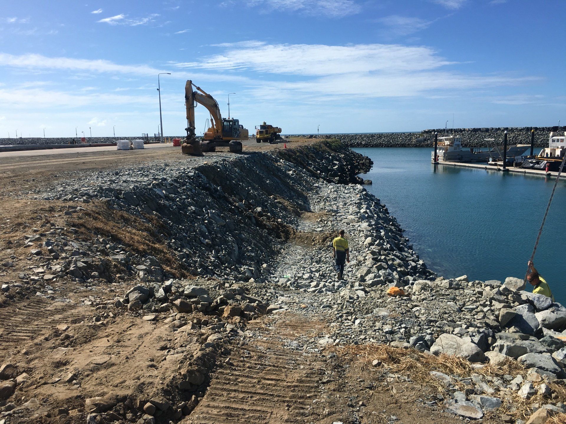 Construction Site With an Excavator and Worker — CJD Investments (NQ) Pty Ltd in Mackay Harbour, QLD