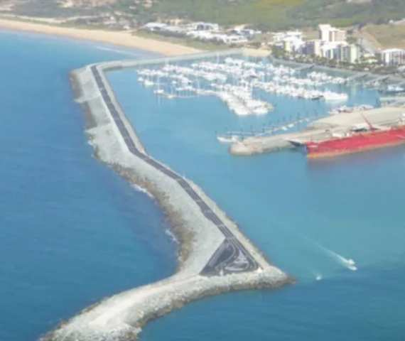 Aerial View of a Coastal Marina With a Long Rock Wall — CJD Investments (NQ) Pty Ltd in Mackay Harbour, QLD