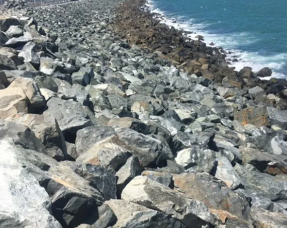 Workers Shoveling Wet Concrete Into a Form — CJD Investments (NQ) Pty Ltd in Mackay Harbour, QLD