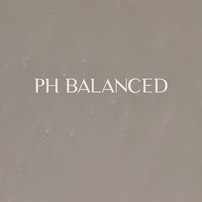 White text reading “PH BALANCED” on a beige background