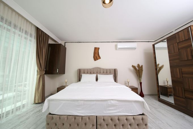 There is a large bed in the middle of the room.