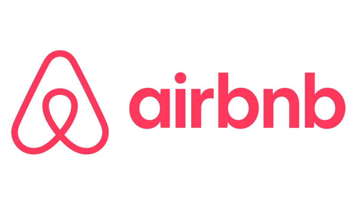 Airbnb logo in pink with stylized heart-shaped “A” icon and wordmark