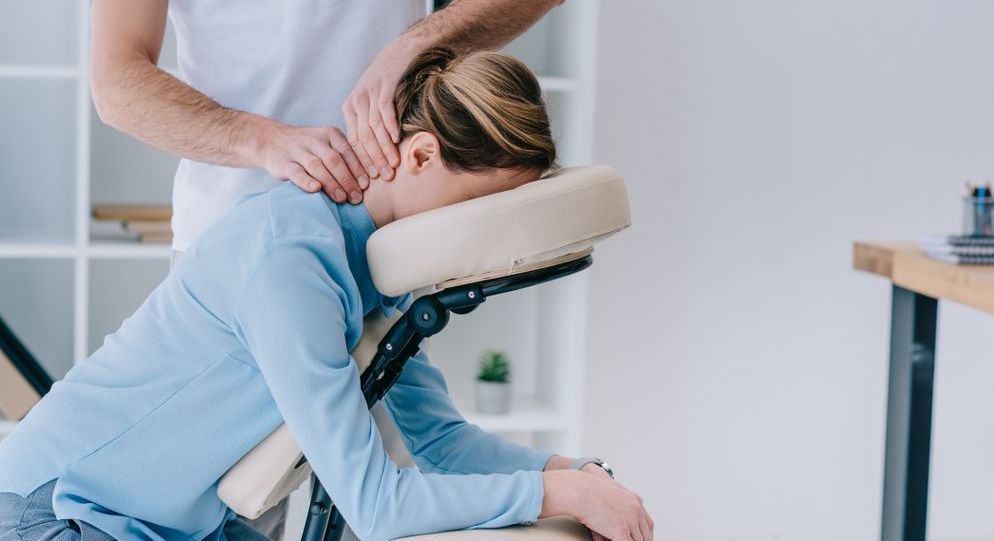 St . Charles woman receiving massage therapy