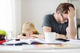 Father stressed when parenting his child.
