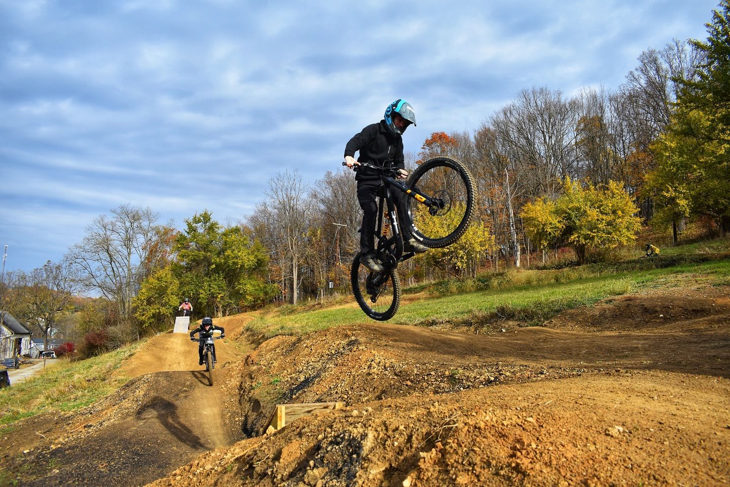 mountain bike riders in the woods