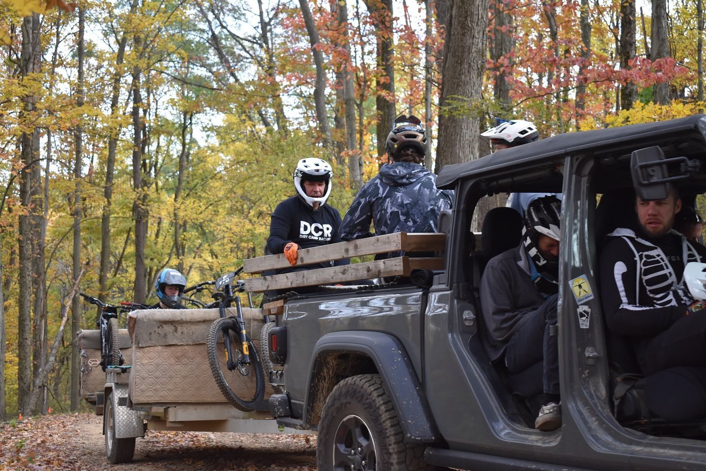 mountain bike riders in the woods